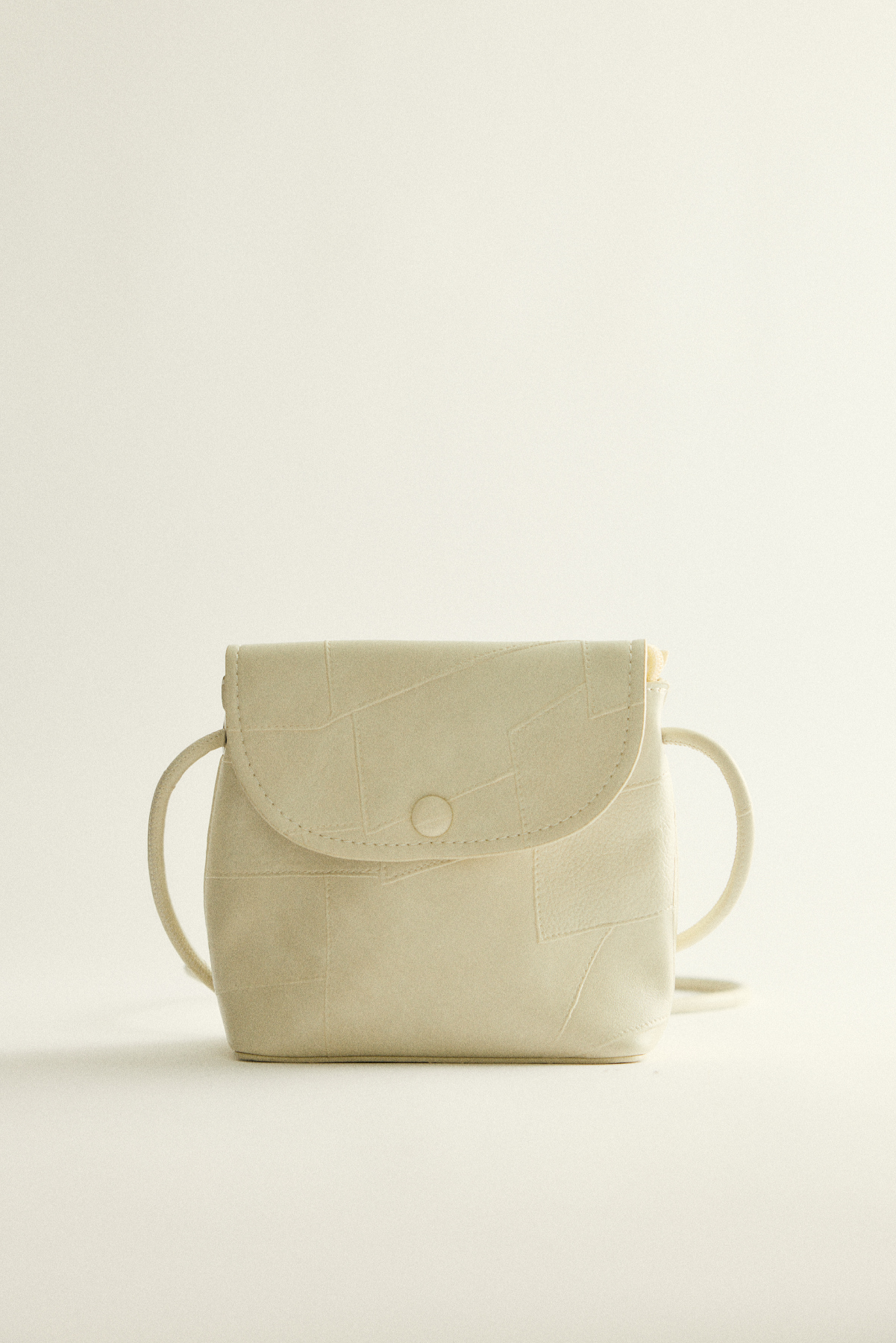 Geometrik Dokulu Deri Görünümlü Küçük Kırık Beyaz Kadın Çanta