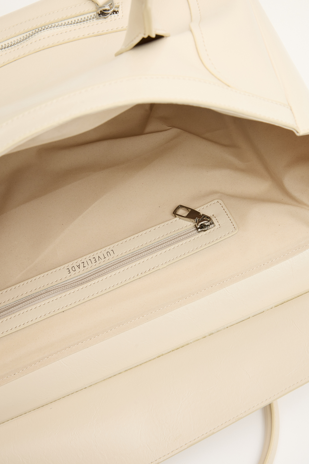 Fermuar Detaylı Geniş Form Kemik Kadın Çanta